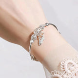 Brazalete ajustable con hojas de plata