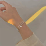Brazalete ajustable con corazón de plata
