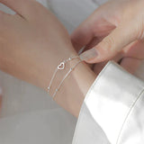 Brazalete ajustable con corazón de plata