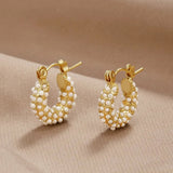 Pendientes de perlas doradas