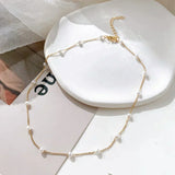 Collar pequeño de perlas en oro