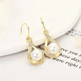 Pendientes de perla en dorado
