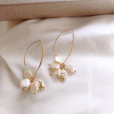 Pendientes elegantes con perla y cristal