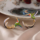 Pendientes creativos exclusivos en forma de colibrí