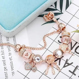 Pulsera Atrapasueños Rosa con Dijes de Plata