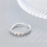 Anillo ajustable en plata y esmalte pintado a mano con margaritas