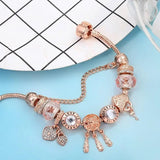 Pulsera Atrapasueños Rosa con Dijes de Plata