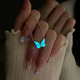 Conjunto de collar y pulsera con mariposa azul luminosa