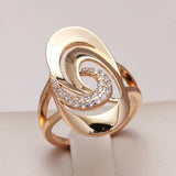Anillo Espiral Oro y Circonias