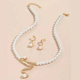 Set de Collar y Aretes de Perlas Naturales