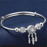 Brazalete ajustable con hojas de plata