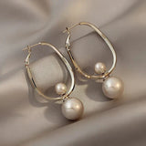 Pendientes encantadores con perlas
