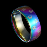 Anillo artesanal en acero inoxidable con huella de pata arcoíris