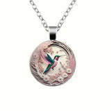 Lunéa™ | Collar con Colgante de Colibrí bajo Cúpula de Cristal