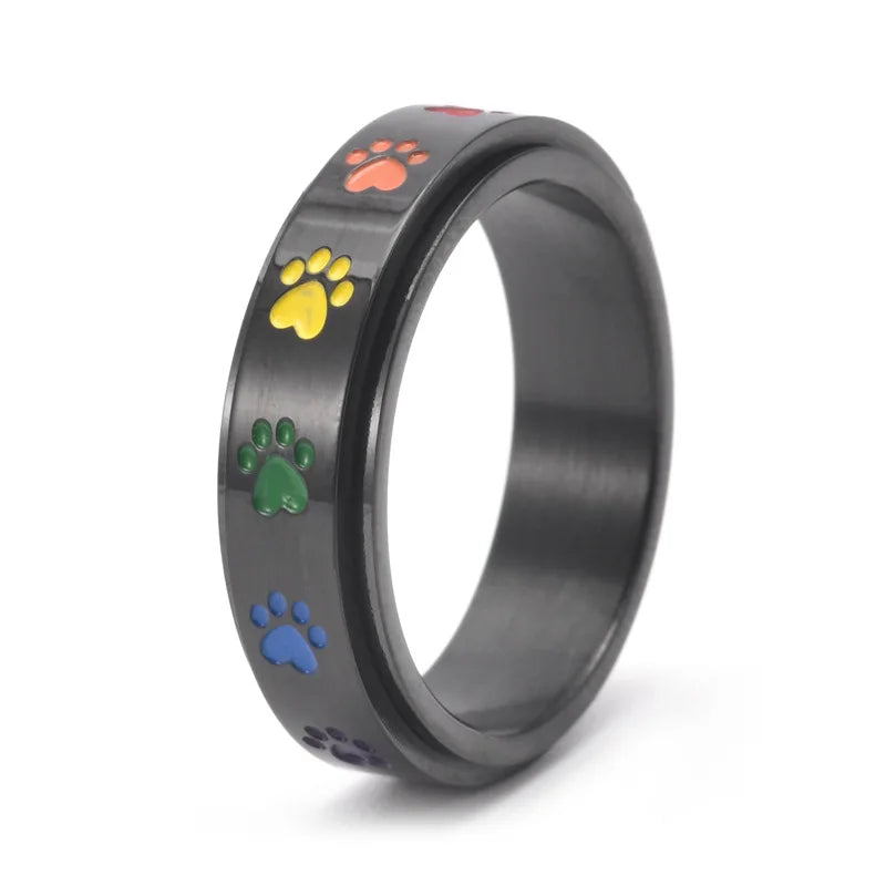 Anillo giratorio para reducir el estrés – Acero inoxidable con patas arcoíris