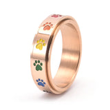 Anillo giratorio para reducir el estrés – Acero inoxidable con patas arcoíris