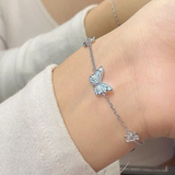 Conjunto de collar y pulsera con mariposa azul luminosa