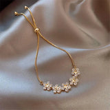 Brazalete Margarita Cristal en Oro