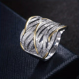 Anillo elegante con varias capas torcidas