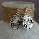 Pendientes Wave Plateados