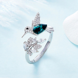 Anillo ajustable con pájaros y zirconia azul