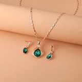 Set de collar y aretes en cristal verde y oro