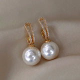 Elegantes pendientes de perlas con circonitas