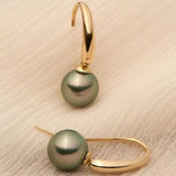 Pendientes elegantes de perla de Oliveira