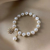 Brazalete oro blanco y perla