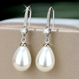 Evelyn | Pendientes artesanales con perlas naturales cintilantes