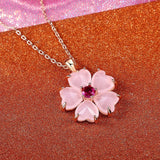 Collar con colgante de flor en oro rosa