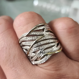 Anillo elegante con varias capas torcidas