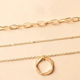 Collar Vintage con Cadenas en Capas y Colgante Dorado