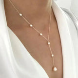 Collar vintage con colgante de perlas