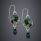 Pendientes vintage con gato negro tropical